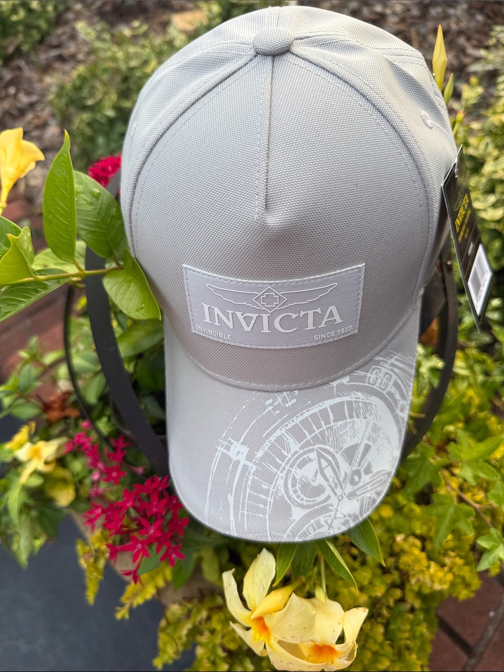 # 134 Invicta Light Gray Logo Cap with Subtle Dial Graphic